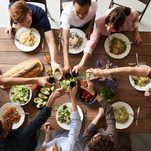 group-of-people-making-toast-3184183